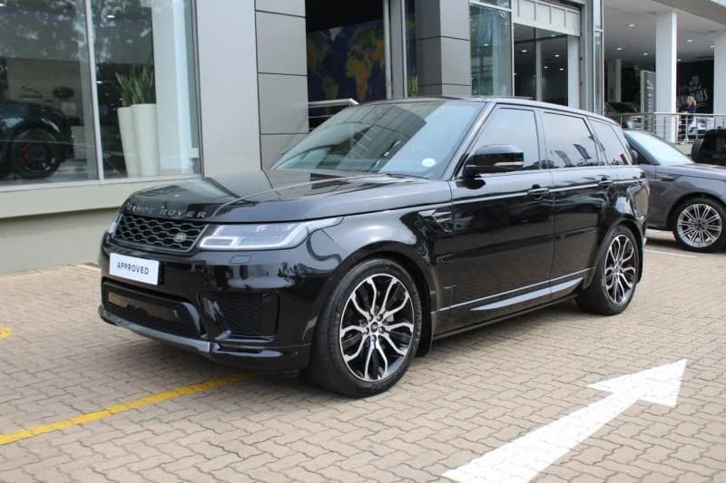 Black Range Rover Sport HSE with approved badge parked at a dealership